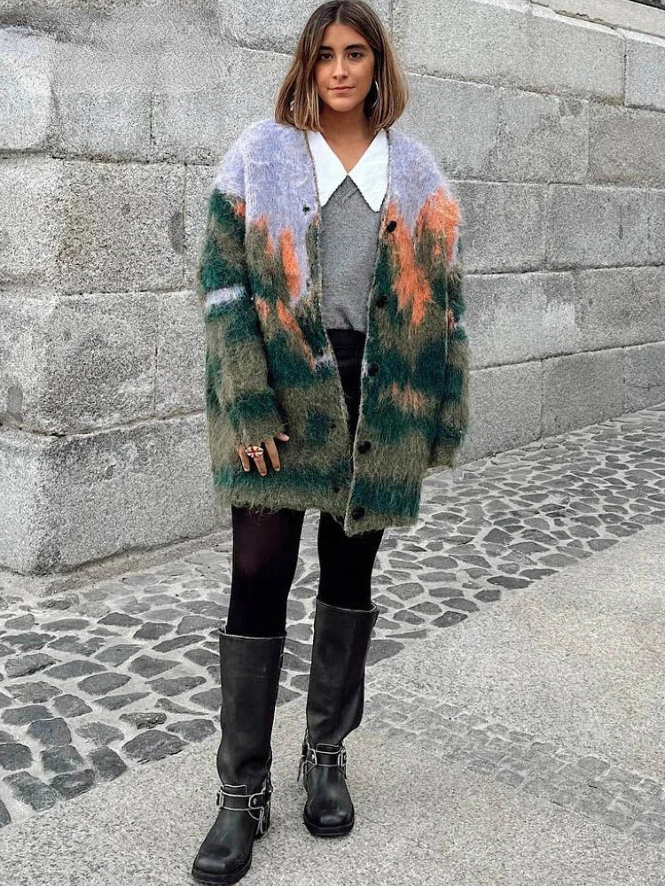 Multicolor fuzzy cardigan for women with long sleeves, featuring a soft, textured knit and an open-front design.