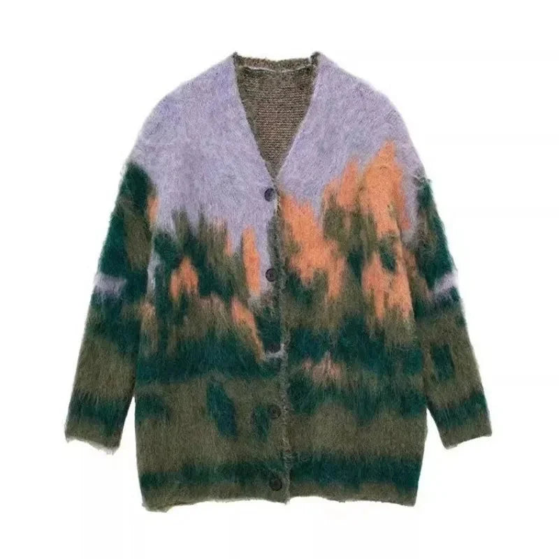 Multicolor fuzzy cardigan for women, featuring long sleeves and a soft texture, perfect for layering in cooler weather.