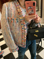 Women’s multicolor tweed jacket featuring fringed edges, classic fit, and textured fabric for a stylish and comfortable look.