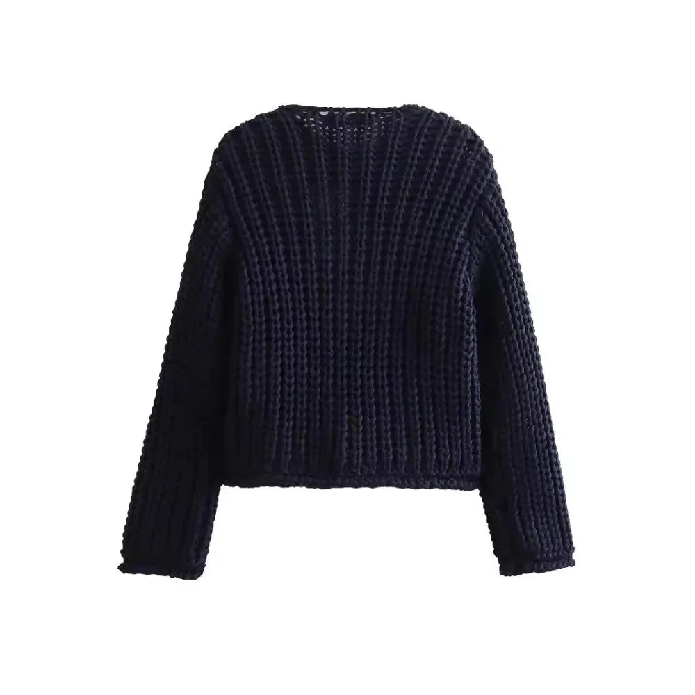Women's navy buttoned cardigan in soft knit material with a relaxed fit and classic button-front design for easy layering.