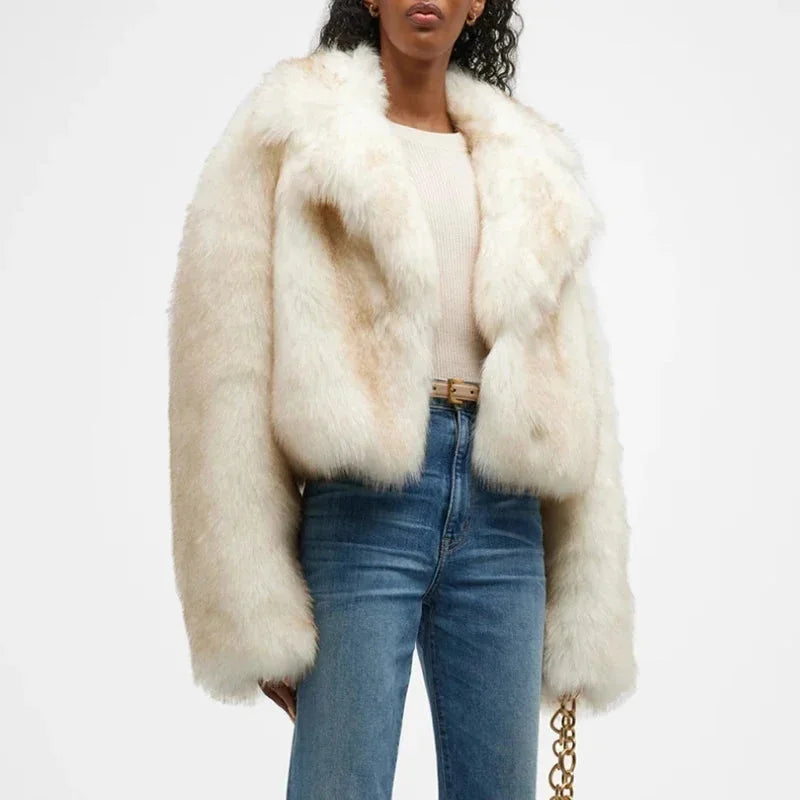 Women's off-white faux fur coat featuring an oversized collar and soft texture, perfect for stylish warmth in cold weather.