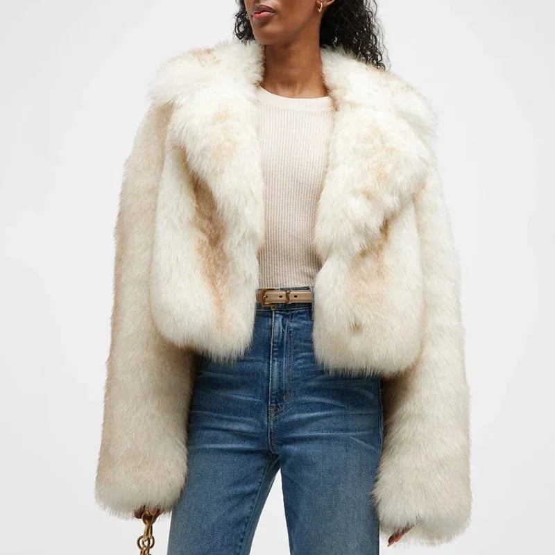 Women's off-white faux fur coat featuring an oversized collar, soft texture, and a cozy, stylish design for cold weather.