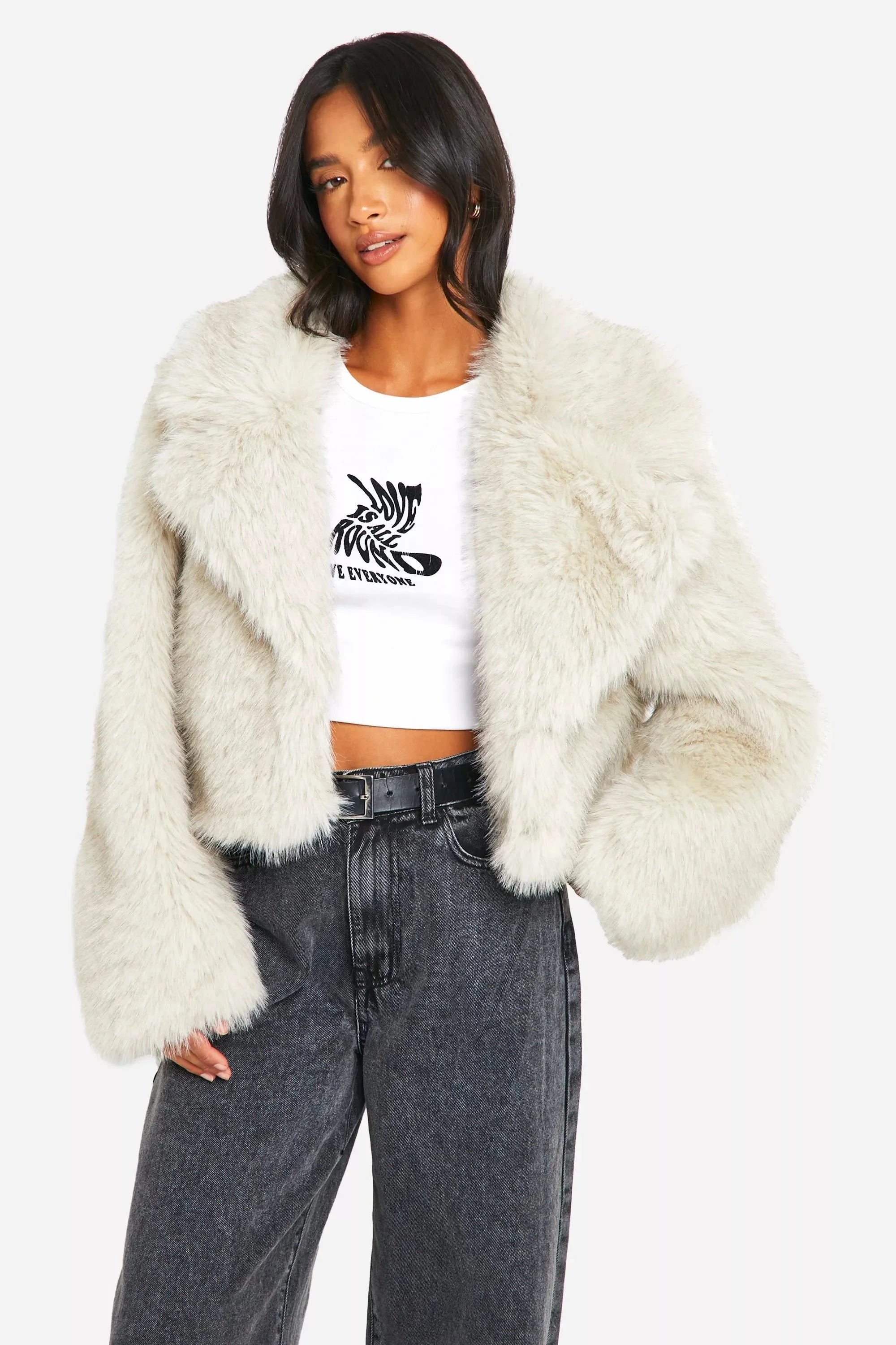 Women's off-white faux fur coat featuring an oversized collar, soft texture, and stylish design for warmth and comfort.