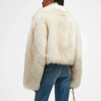 Women's off-white faux fur coat featuring an oversized collar and soft texture for warmth and comfort in cold weather.
