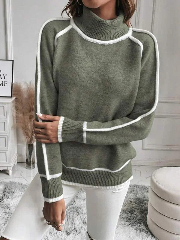 Olive turtleneck sweater for women featuring white accents, made of soft fabric with a comfortable, relaxed fit.
