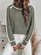 Olive turtleneck sweater for women featuring white accents and soft, warm fabric, perfect for layering in cooler weather.