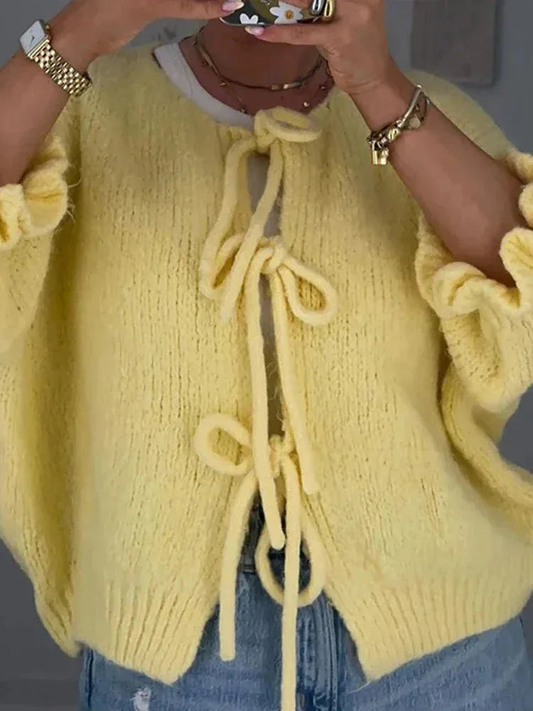 Women's yellow open-front cardigan with bow ties, made from soft cotton blend, featuring a relaxed fit and long sleeves.
