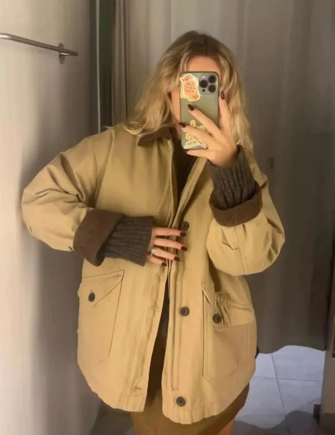 Women's oversized barn jacket featuring a corduroy collar, crafted from durable cotton with large front pockets.