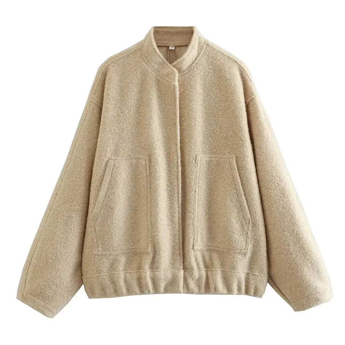 Women's oversized bomber jacket in soft cotton blend, featuring a button-front closure and relaxed fit for casual wear.