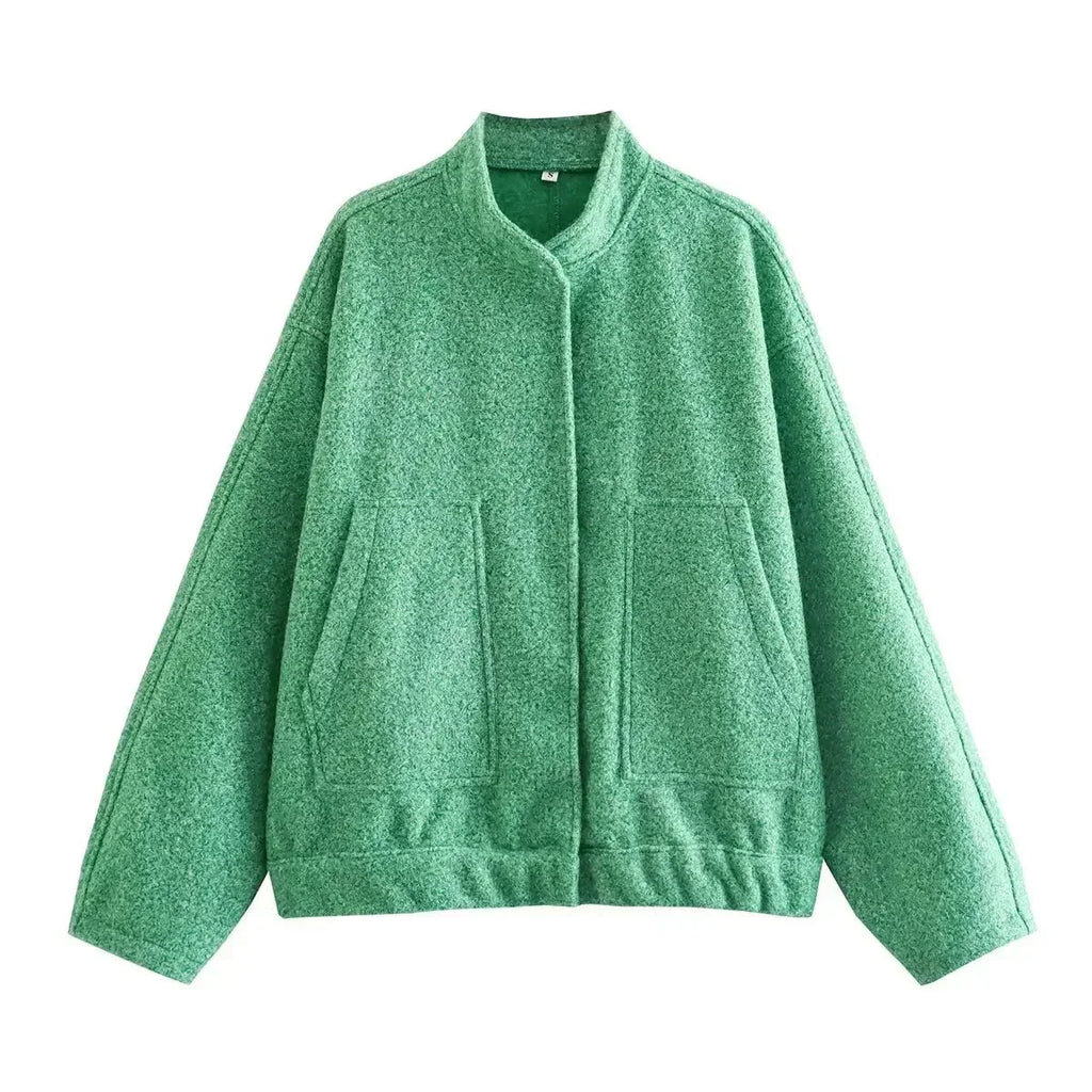 Women's oversized casual bomber jacket with button front, featuring a soft fabric and relaxed fit for everyday wear.