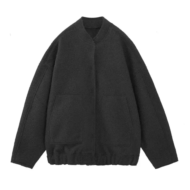 Women's oversized bomber jacket with button-front, crafted from soft cotton blend, featuring a relaxed fit and two front…
