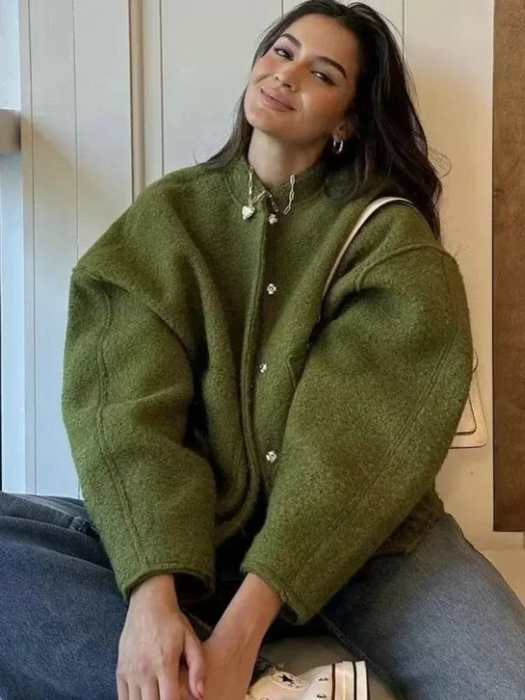 Women’s oversized casual bomber jacket, featuring a button-front design and made from soft, durable cotton blend material.