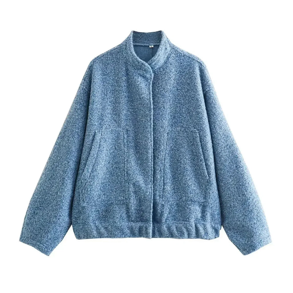 Women's oversized bomber jacket featuring a button-front design, crafted from soft cotton blend, perfect for casual wear.