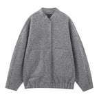 Women's oversized casual bomber jacket in lightweight fabric, featuring a button-front design and roomy fit for comfort.