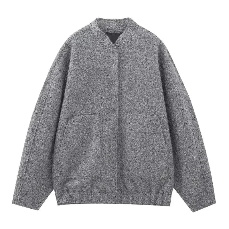 Women's oversized casual bomber jacket in lightweight fabric, featuring a button-front design and roomy fit for comfort.