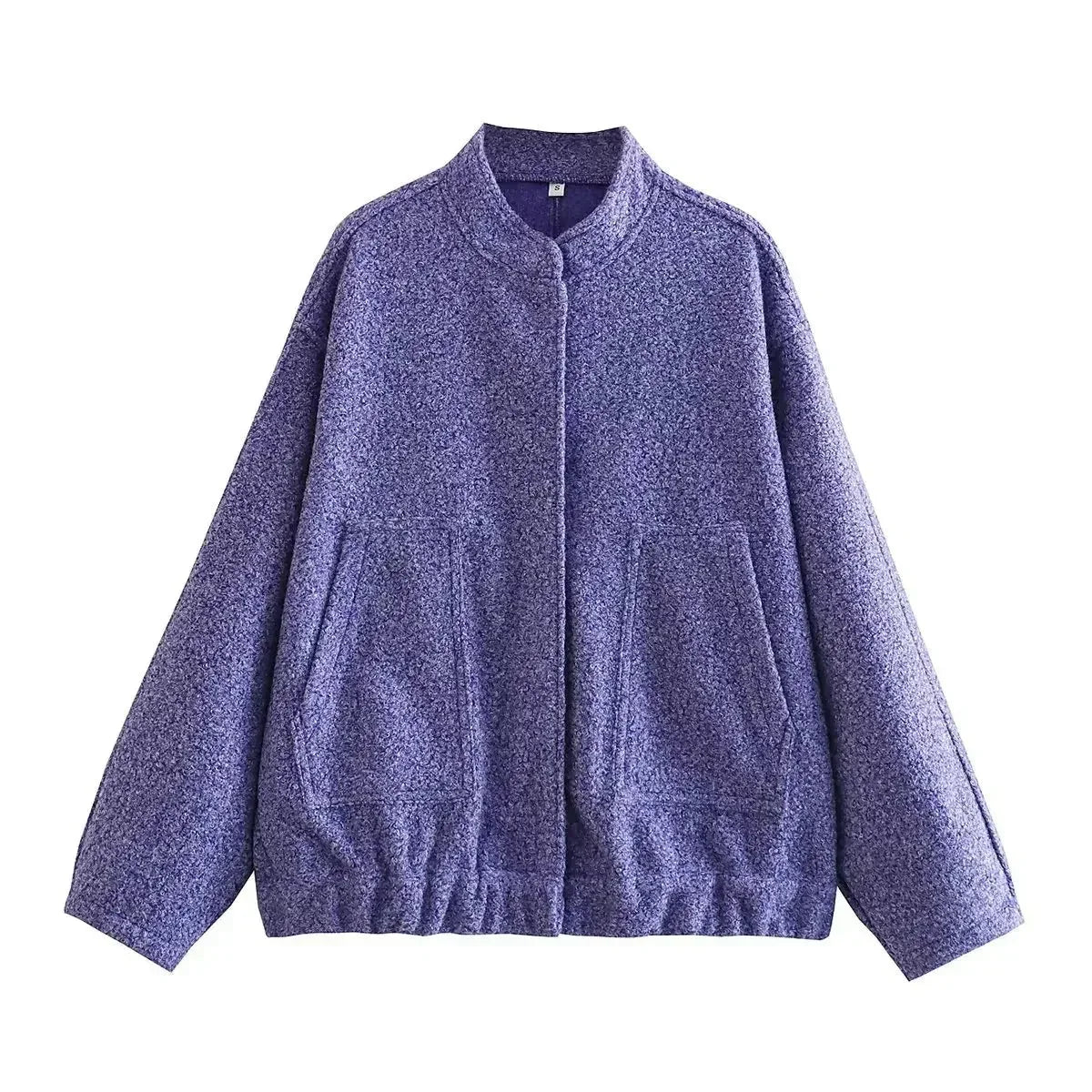 Women’s oversized bomber jacket with button-front, made from lightweight fabric, featuring a relaxed fit and side pockets.