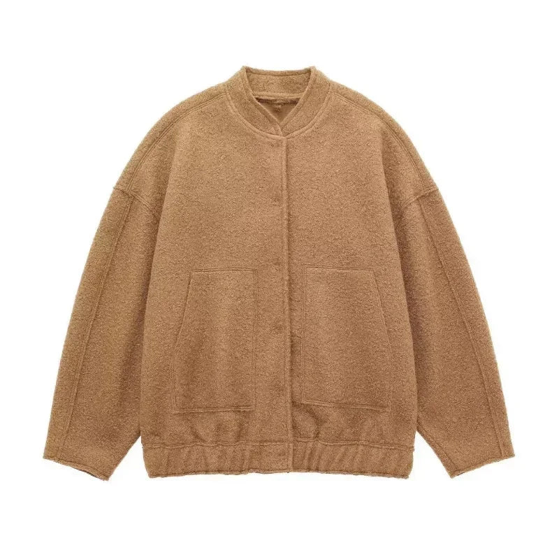 Women's oversized bomber jacket in soft fabric, featuring a button-front design and relaxed fit for casual style.