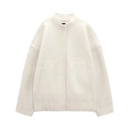 Women's oversized casual bomber jacket featuring a button-front, made from soft cotton blend with ribbed cuffs and hem.