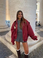 Women's oversized casual jacket with zipper, made from breathable cotton blend, featuring a relaxed fit and practical…
