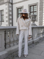 Women's oversized fitted cropped jacket with wide collar, made from soft cotton blend, featuring a relaxed silhouette and…