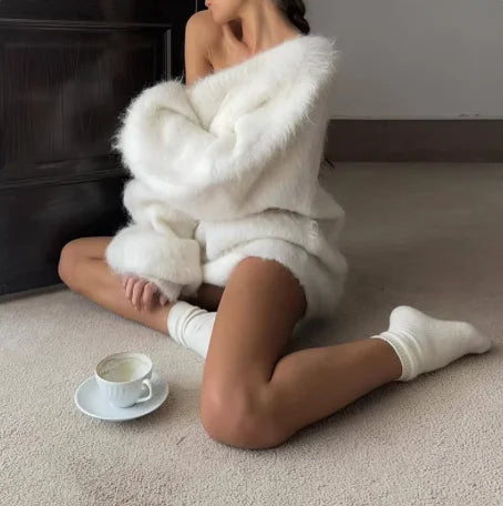 Women's oversized fluffy sweater featuring an off-shoulder design, crafted from soft acrylic for a cozy and relaxed fit.