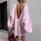 Women's oversized fluffy sweater featuring an off-shoulder design, made from soft, cozy fabric for a relaxed fit.