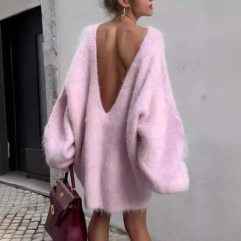 Women's oversized fluffy sweater featuring an off-shoulder design, made from soft, cozy fabric for a relaxed fit.