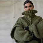 Women's oversized knit sweater dress with turtleneck, made from soft wool blend for warmth and comfort. Cozy and casual…