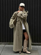 Women's oversized long trench coat featuring wide lapels and a soft cotton blend, ideal for layered outfits.