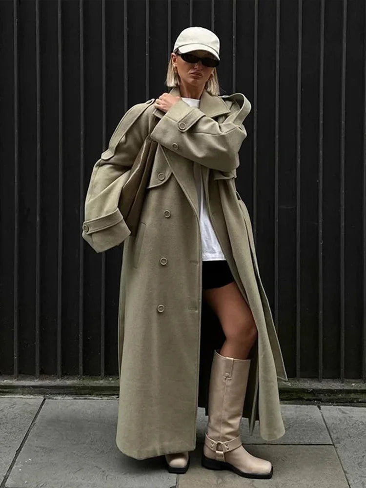 Women's oversized long trench coat featuring wide lapels and a soft cotton blend, ideal for layered outfits.