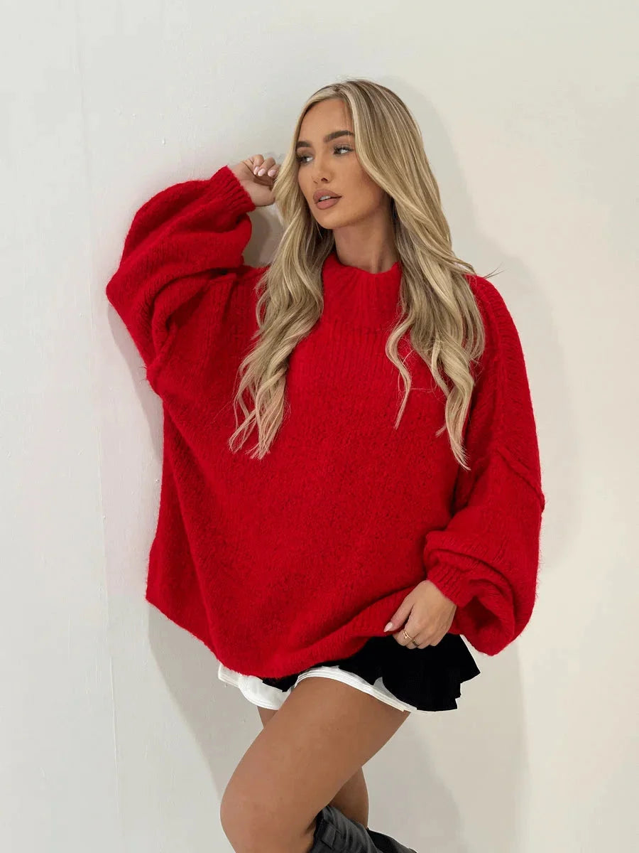 Women's oversized pullover sweater in soft knit, featuring a cozy high neckline and relaxed fit for comfort.