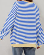 Women's oversized striped long sleeve sweatshirt, made of soft cotton blend, featuring relaxed fit and classic round neck…