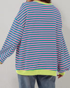 Women's oversized striped long sleeve sweatshirt made from soft cotton blend, featuring a relaxed fit and classic crew…