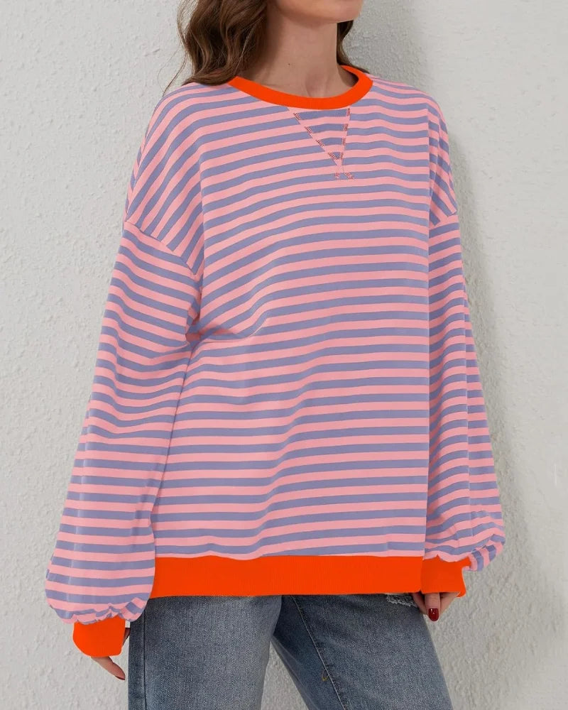 Women's oversized striped long sleeve sweatshirt, made from soft cotton blend, featuring a relaxed fit and casual style.