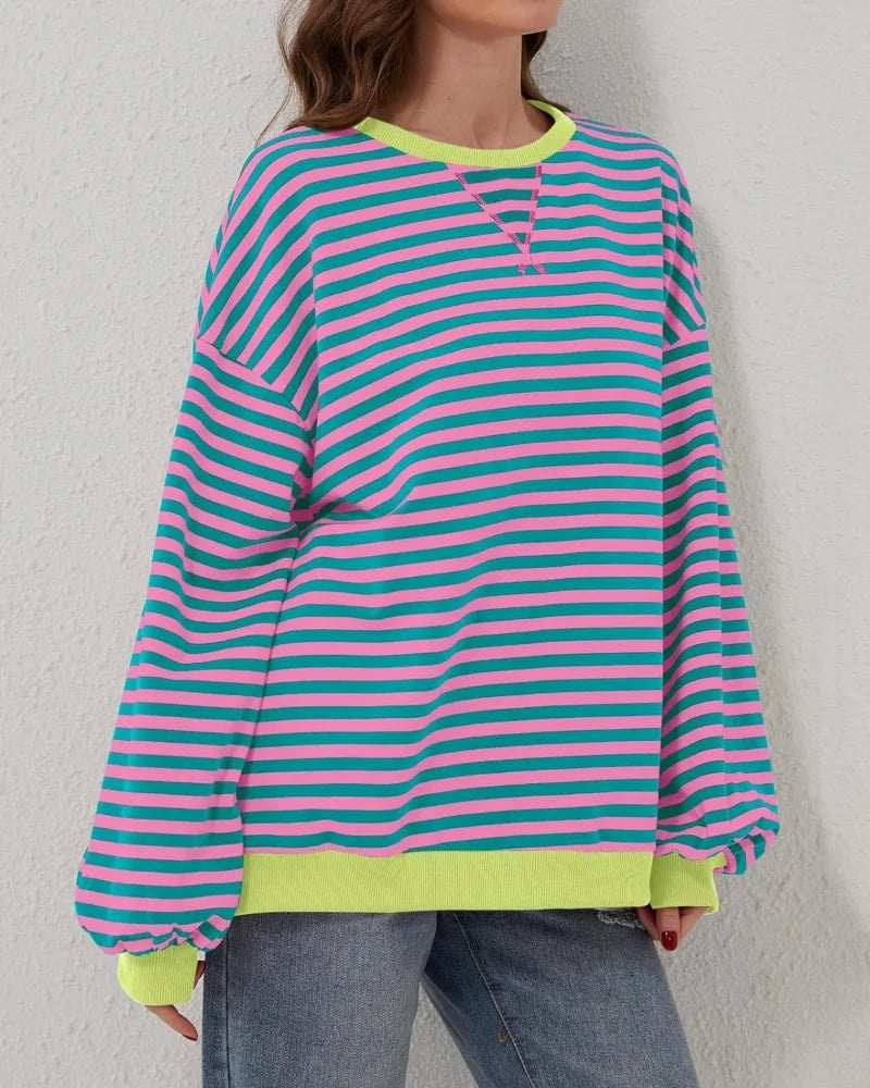 Women's oversized striped long sleeve sweatshirt in soft cotton blend, featuring a relaxed fit and crew neckline for comfort.