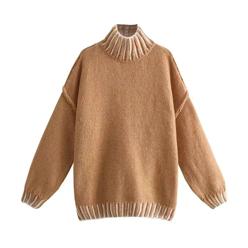 Women's oversized sweater featuring soft fabric and stylish striped details for a relaxed, comfortable fit.