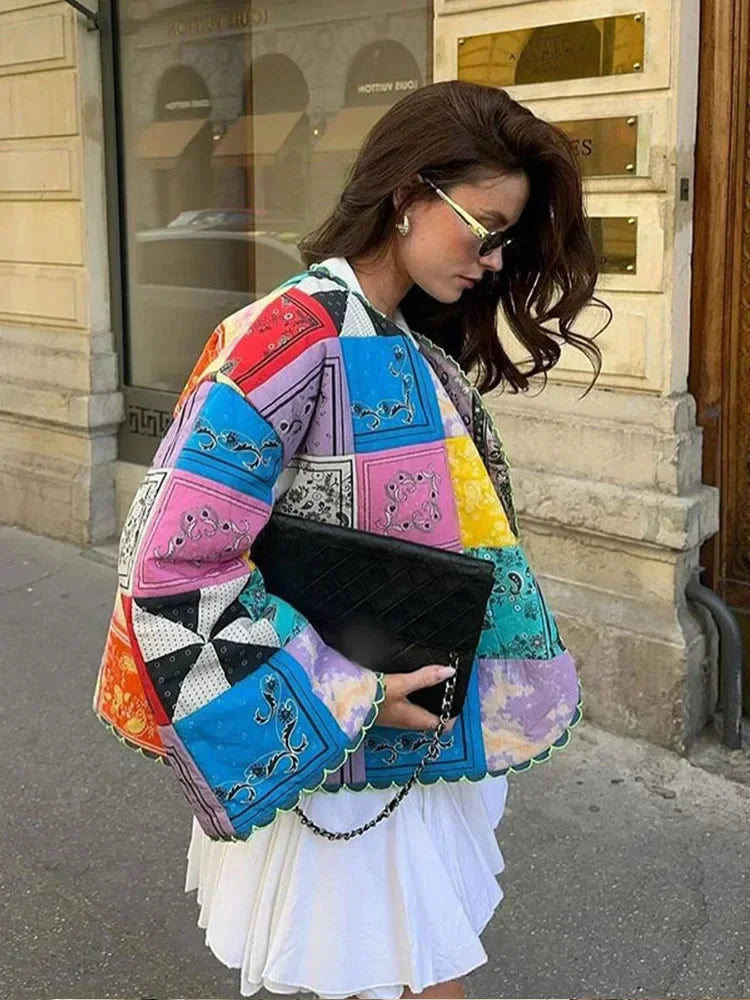 Colorful women's patchwork jacket with long sleeves, crafted from a mix of cotton and polyester for comfort and style.