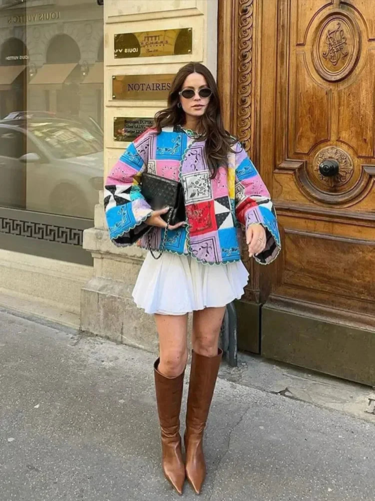 Colorful women's patchwork jacket with long sleeves, made of durable fabric and featuring a unique, eye-catching design.