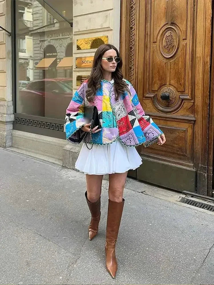 Women's colorful patchwork jacket featuring long sleeves, made from a blend of cotton and polyester for comfort and warmth.