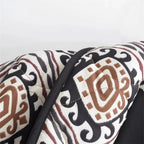 Women's patterned jacket with wide sleeves, featuring a soft fabric and unique floral design in vibrant colors.