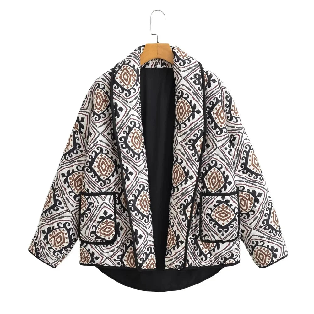 Women's patterned jacket with wide sleeves, made of soft cotton blend for comfort, featuring a colorful geometric design.