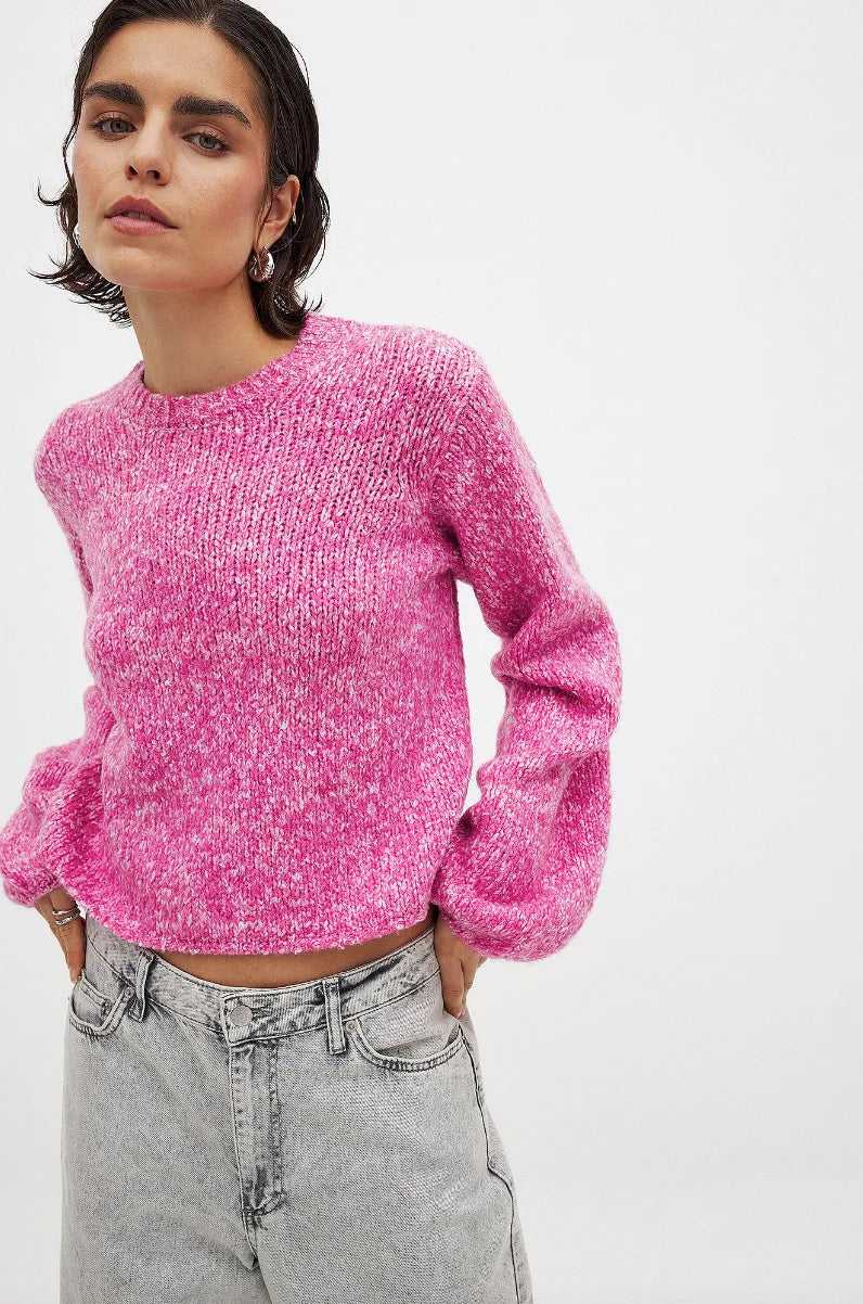 Women's pink backless pullover with long sleeves, made from soft knit fabric with a relaxed fit for comfort and style.