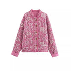Women's pink boho floral jacket with long sleeves, crafted from lightweight fabric featuring a vibrant floral pattern.