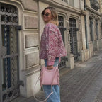 Women's pink boho floral jacket featuring long sleeves, made of lightweight fabric with vibrant floral patterns.