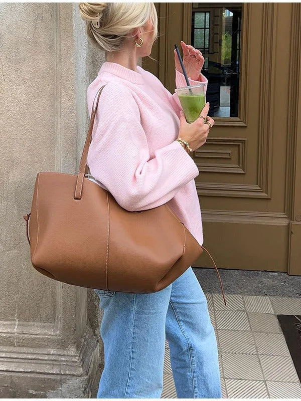 Women's pink round neck pullover with long sleeves, made of soft cotton blend for comfort and everyday wear.