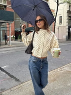 Women's long sleeve jacket with a stand neck, featuring a polka dot pattern made from breathable cotton blend fabric.