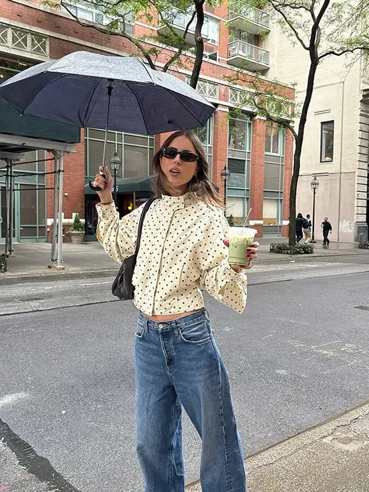 Women's long sleeve casual jacket featuring a polka dot pattern and stand neck design, made from soft, breathable fabric.