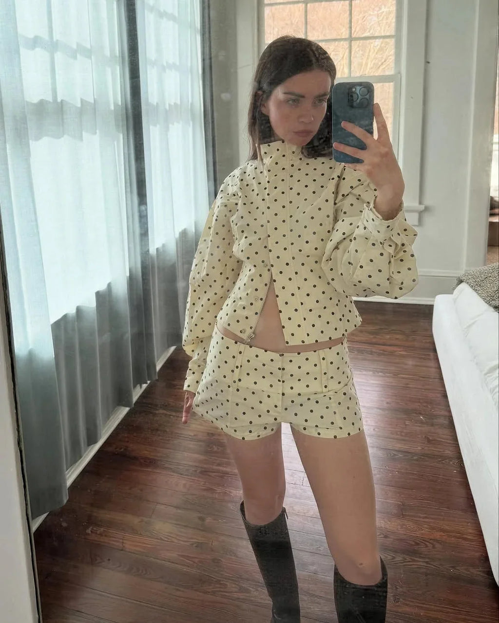 Women's long sleeve polka dot jacket with a stand neck, crafted from soft fabric for casual comfort and versatile style.