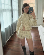 Women's long sleeve polka dot jacket with a stand neck, crafted from soft fabric for casual comfort and versatile style.