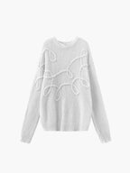Alt text: Women's pullover sweater in soft fabric, featuring a textured swirl design ideal for layering in cooler weather.